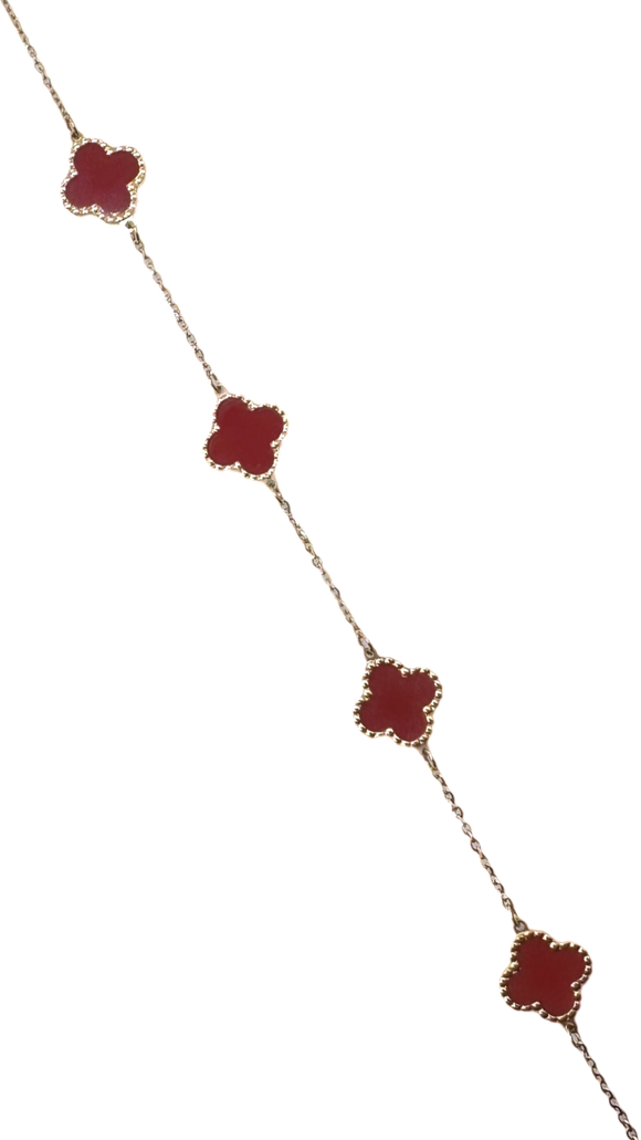 Bracelet avec trèfle rouge